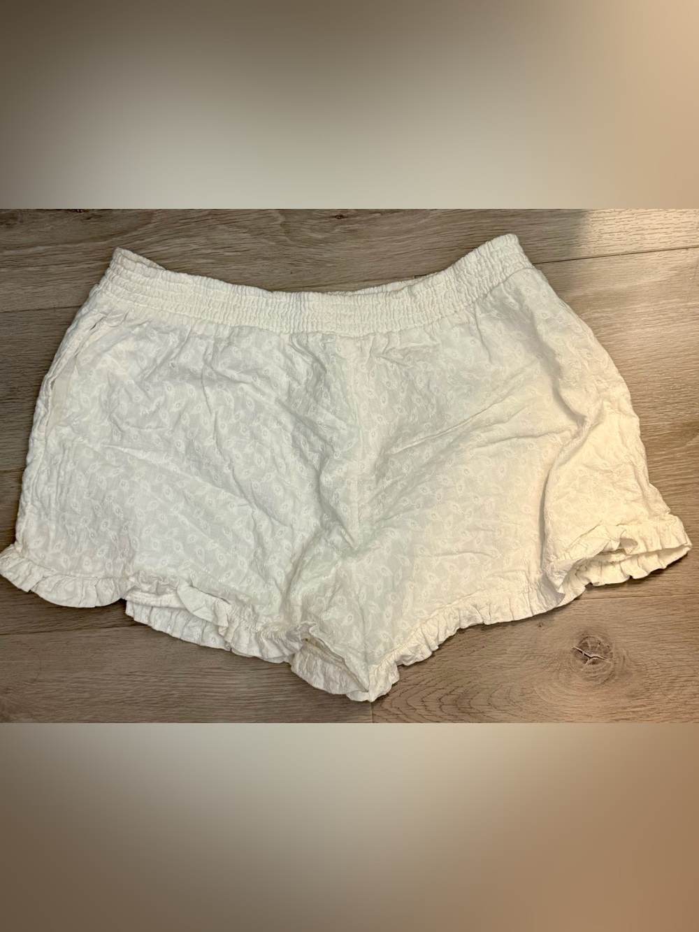 White Eyelet Ruffle Elastic Waist Shorts. Designed by Roxy. Like New Condition
